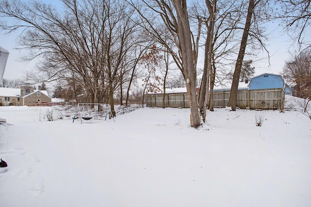 view of yard covered in snow