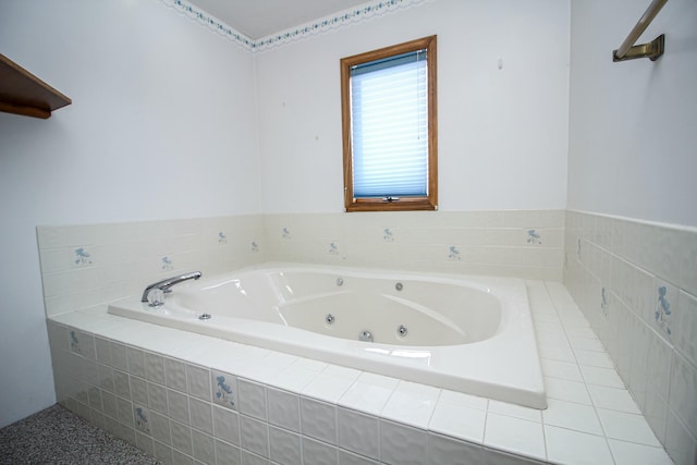 bathroom featuring tiled tub