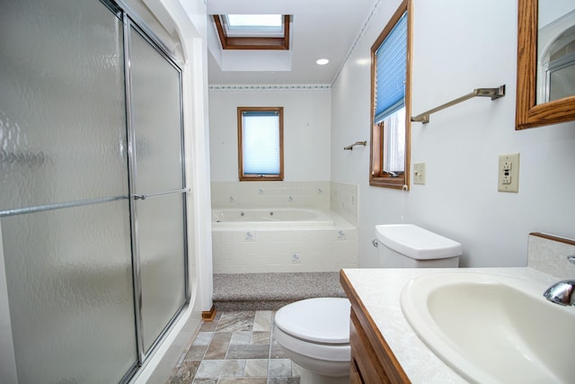 full bathroom with vanity, toilet, a skylight, and plus walk in shower