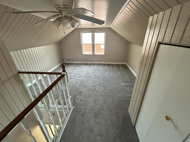 bonus room featuring ceiling fan, lofted ceiling, and carpet floors