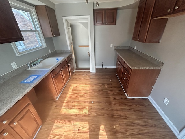 kitchen featuring light hardwood / wood-style floors and sink