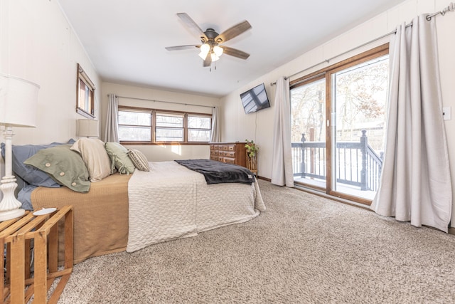 bedroom featuring ceiling fan, carpet floors, and access to outside