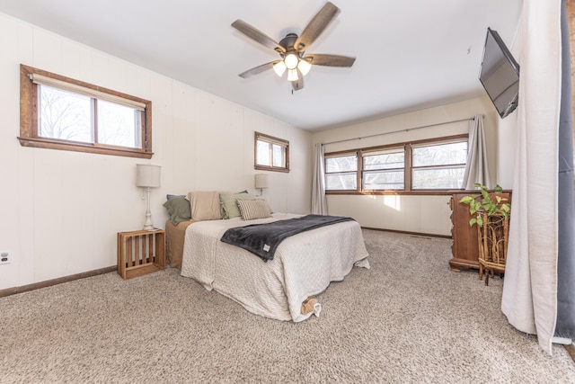 bedroom with ceiling fan and carpet