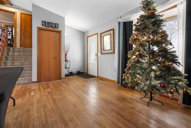 entrance foyer with hardwood / wood-style floors