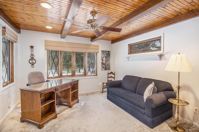 carpeted office space featuring ceiling fan, beam ceiling, and wood ceiling