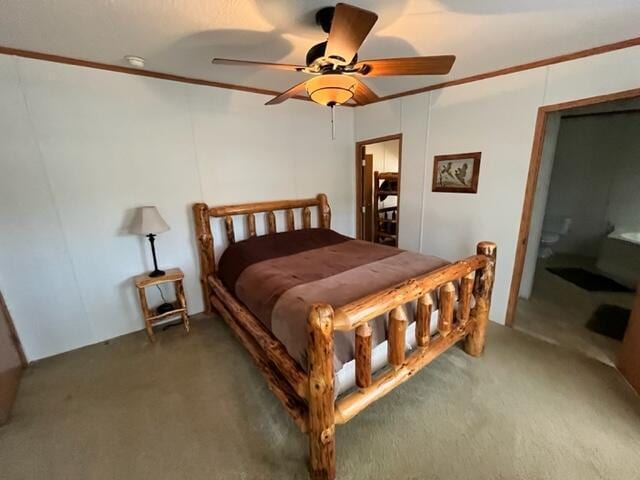 bedroom featuring ceiling fan and dark carpet