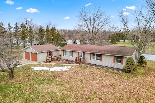 ranch-style home with a garage and a front yard