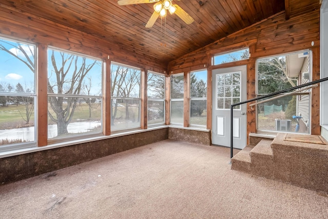 unfurnished sunroom with lofted ceiling, wood ceiling, and ceiling fan