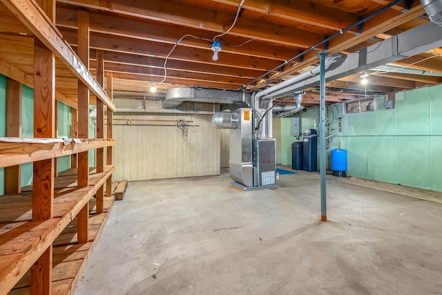 basement featuring heating unit