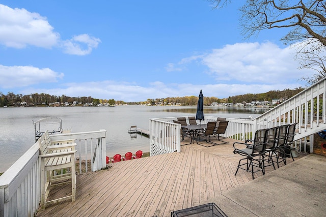 deck featuring a water view