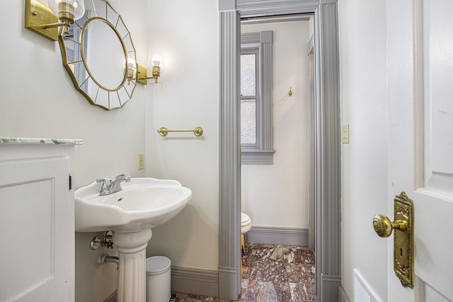 bathroom with sink and toilet