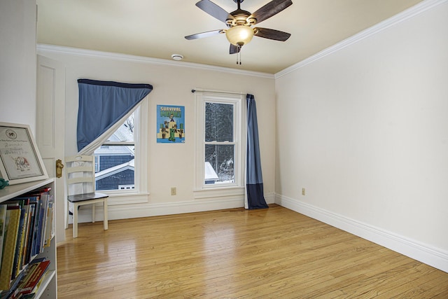 interior space with ceiling fan, ornamental molding, and light hardwood / wood-style floors