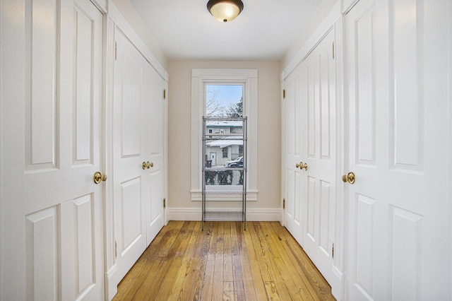 corridor featuring light wood-type flooring