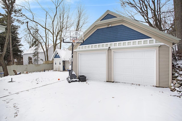 view of snow covered garage