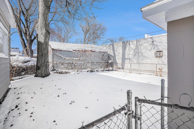 view of yard covered in snow