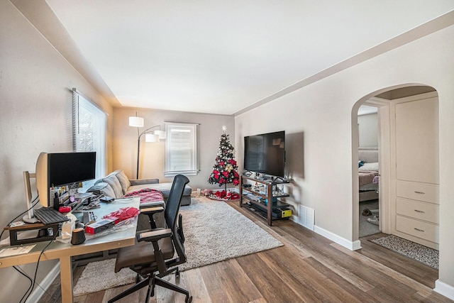 office space with hardwood / wood-style flooring