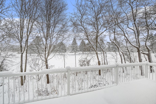 view of snow covered deck