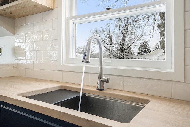 room details with sink and decorative backsplash