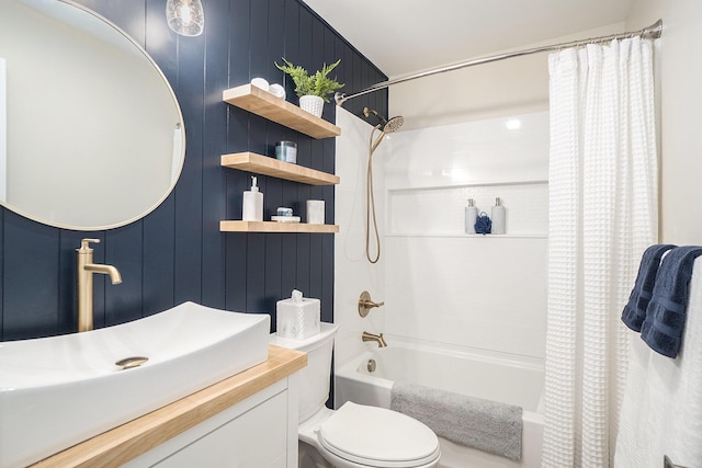 full bathroom with sink, wood walls, toilet, and shower / bathtub combination with curtain