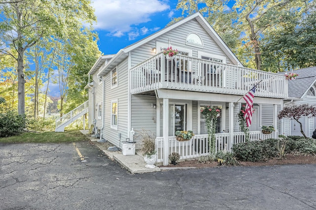 view of front property featuring covered porch