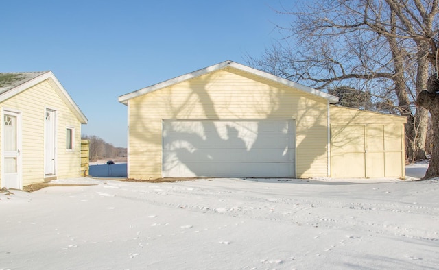 view of snow covered garage