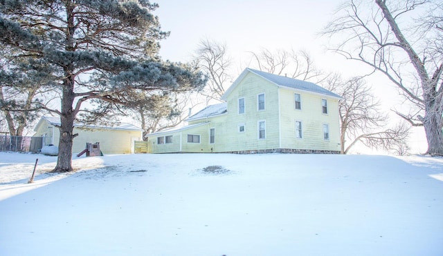 view of snow covered property