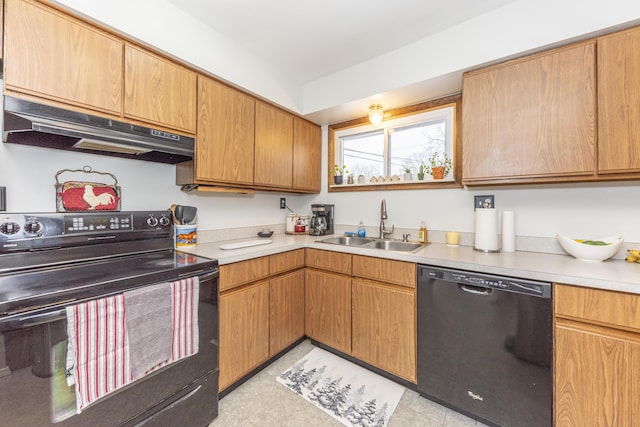 kitchen with black appliances and sink