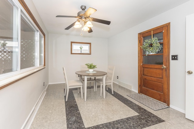 dining area with ceiling fan