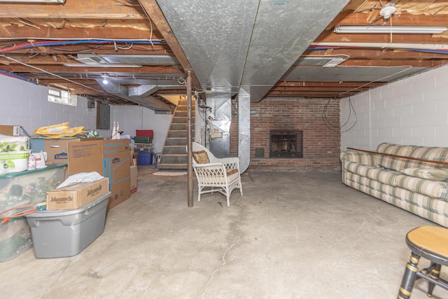 basement with a fireplace