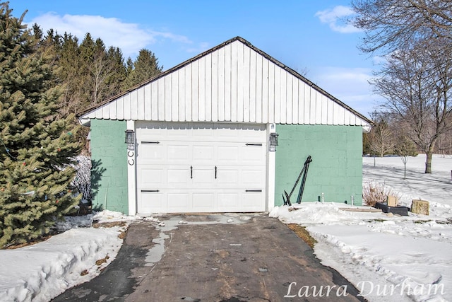 view of snow covered garage