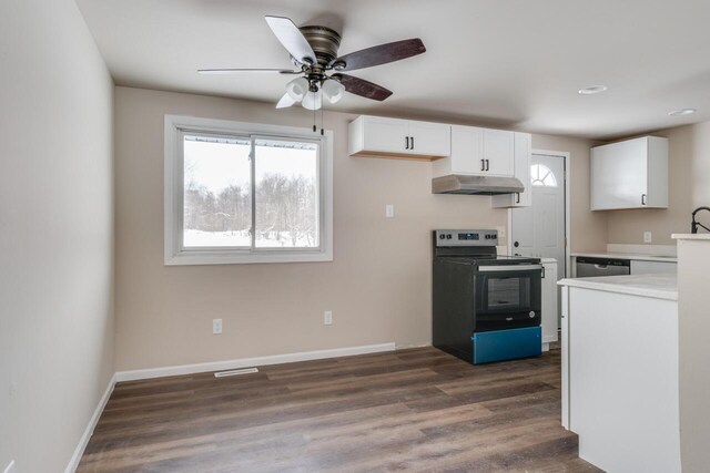 kitchen featuring ceiling fan, electric range, dark hardwood / wood-style flooring, stainless steel dishwasher, and white cabinets