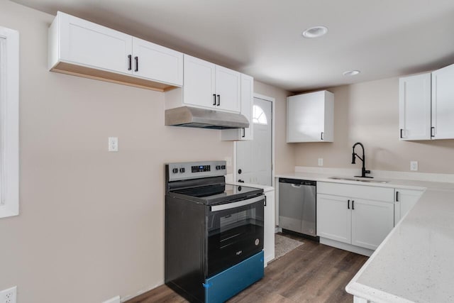 kitchen featuring sink, white cabinets, dark hardwood / wood-style floors, and stainless steel appliances