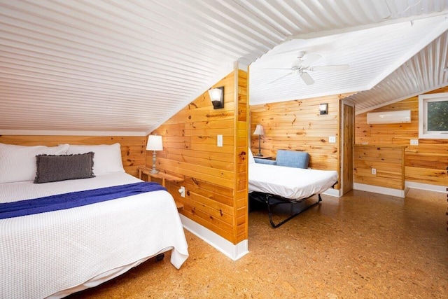 bedroom with wood walls, a wall mounted air conditioner, vaulted ceiling, and ceiling fan