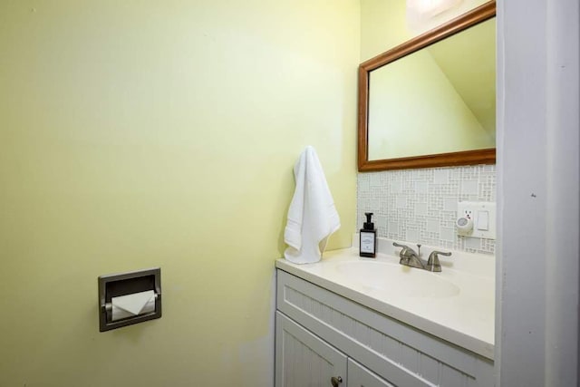 bathroom featuring backsplash and vanity