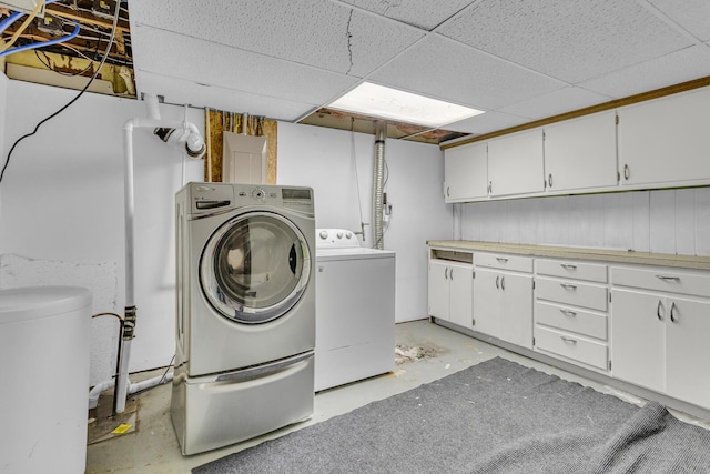 laundry area with cabinets and independent washer and dryer