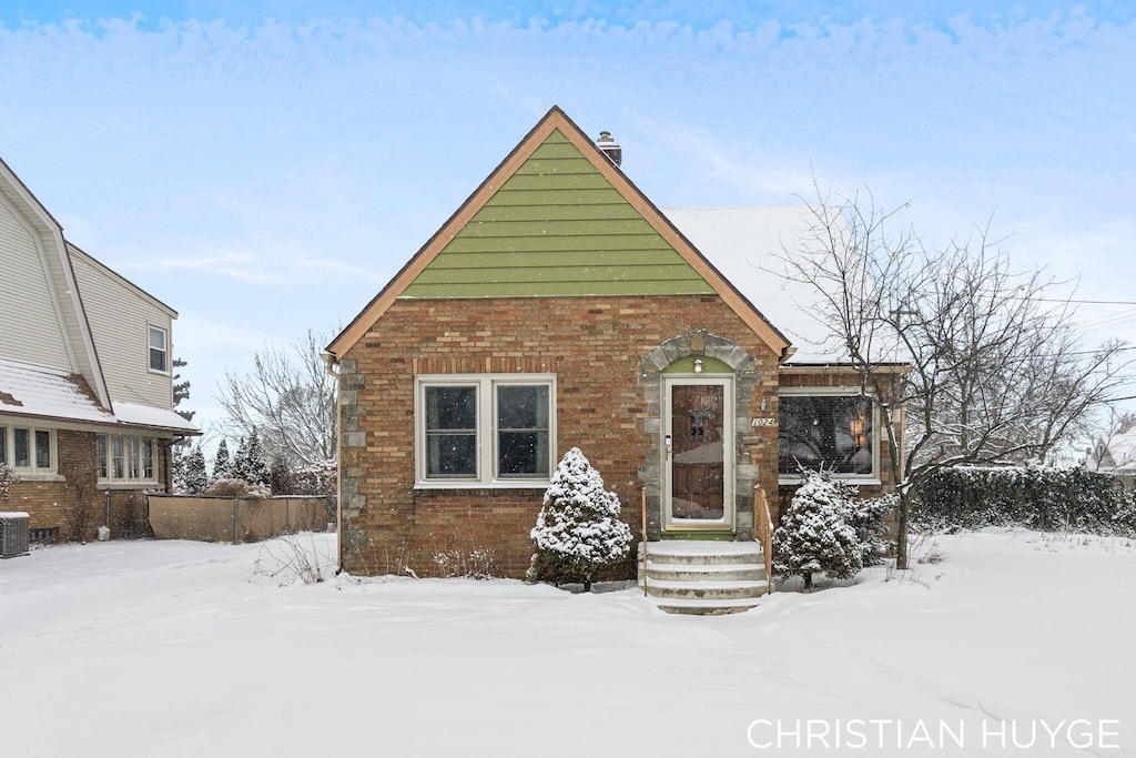 view of front of home with central AC unit