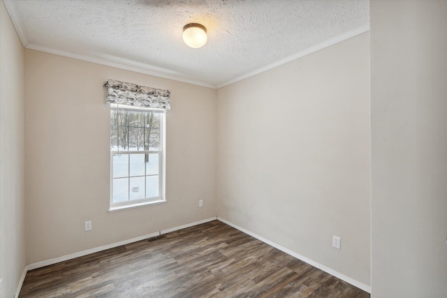 unfurnished room featuring dark hardwood / wood-style flooring, a textured ceiling, and ornamental molding