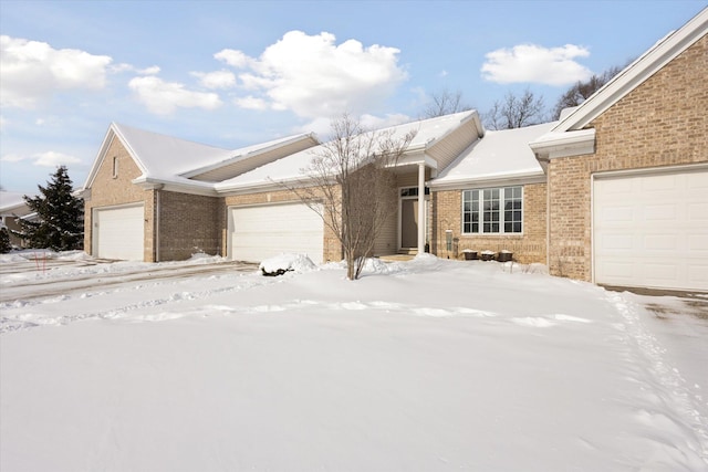 single story home featuring a garage