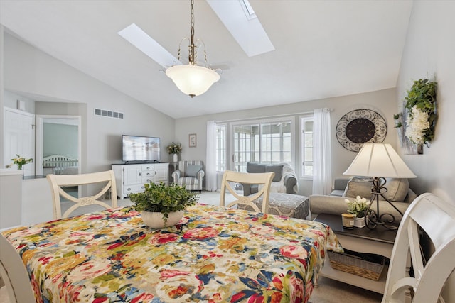 bedroom with vaulted ceiling with skylight