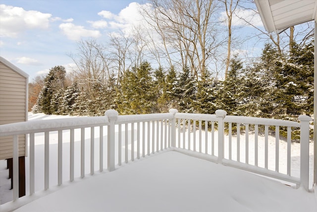 view of snow covered deck