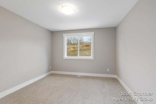 empty room featuring carpet floors