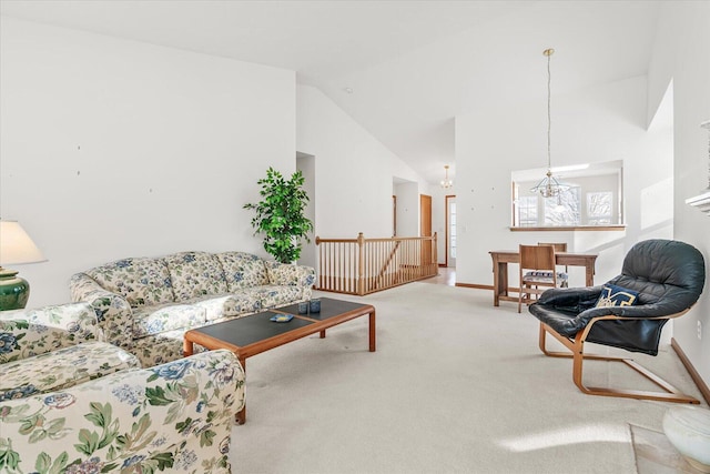 living room with high vaulted ceiling and carpet floors