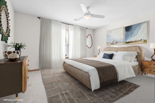 bedroom featuring ceiling fan and carpet flooring