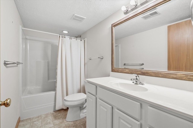 full bathroom featuring toilet, a textured ceiling, shower / bath combo, and vanity