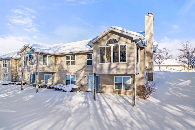 view of snow covered property