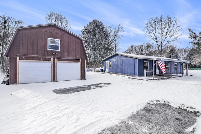 view of snow covered garage