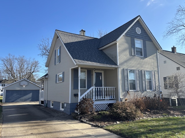 view of front of home with an outdoor structure and a garage