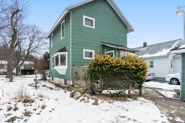 view of snow covered property