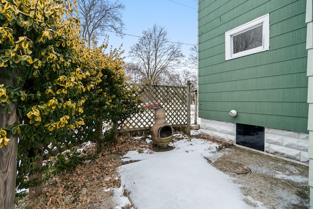 view of snow covered patio