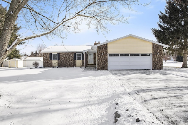 ranch-style home featuring a garage